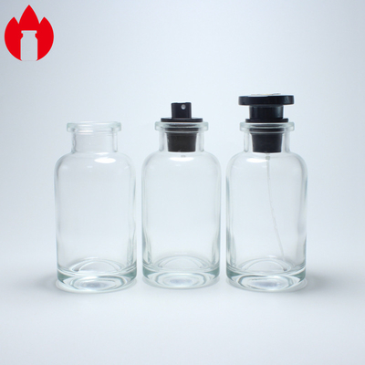 Botella de vidrio de perfume moldeado y transparente de 100 ml
