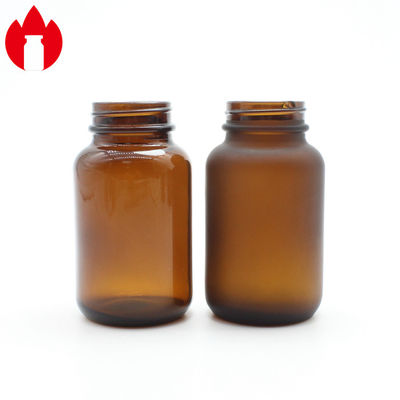 Botella de vidrio de licor de soda de color ámbar para tabletas o pastillas